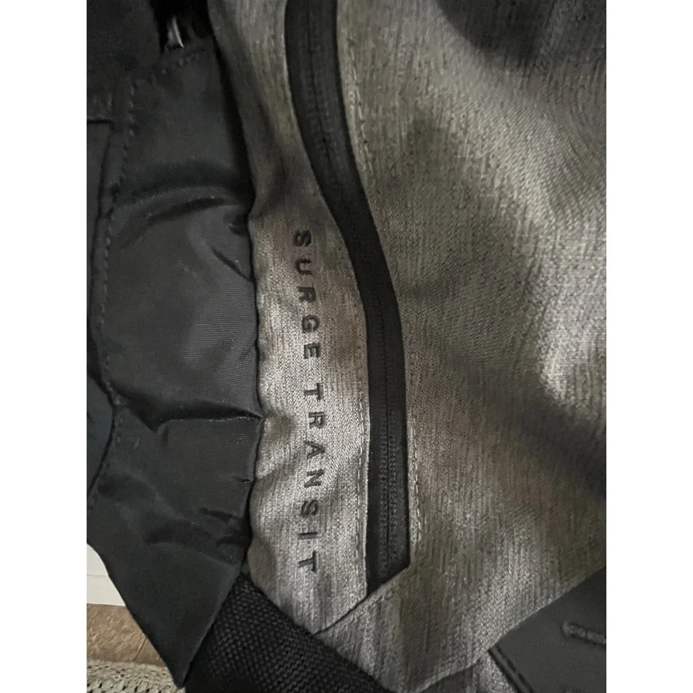 The‎ North Face Surge Transit Backpack 38L – Grey Heather/Black